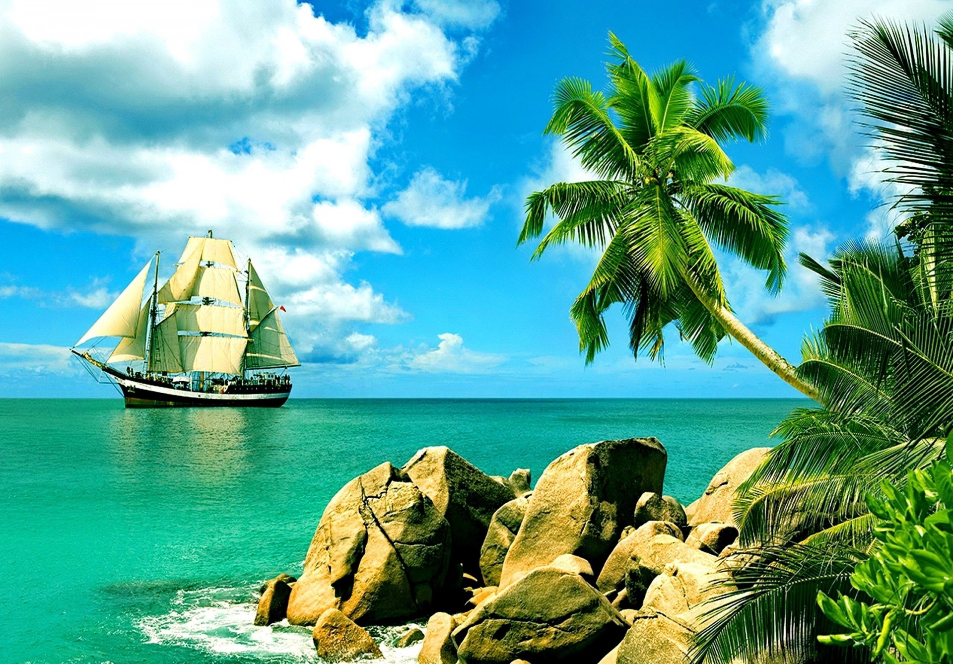 камни пляж пальмы природа корабль тропики лето отдых небо облака парусник прекрасный рай