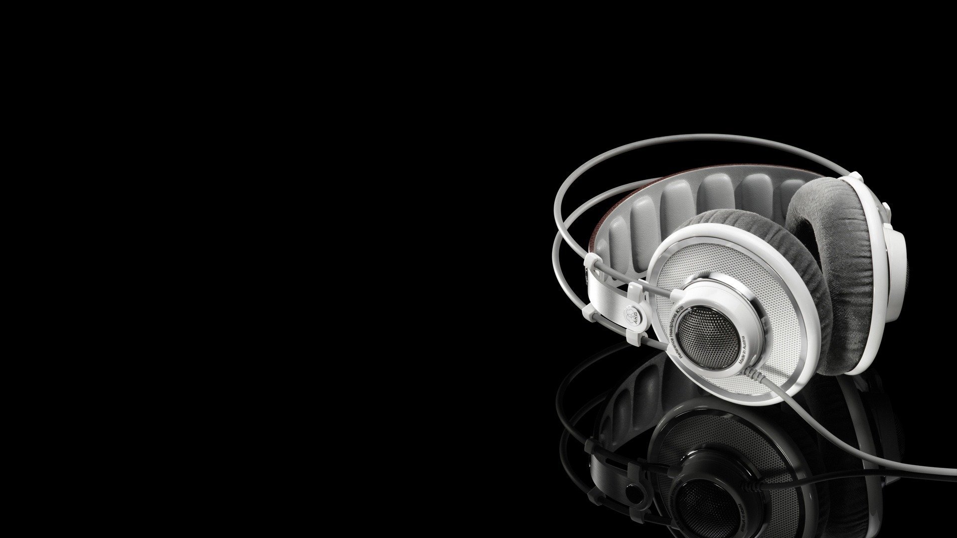 headphones black background reflection
