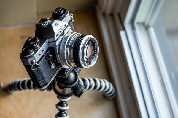 Pentax kx macro camera on the windowsill