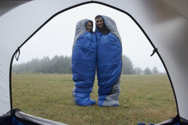 A date in sleeping bags in nature