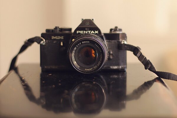 Vintage pentax camera on the table