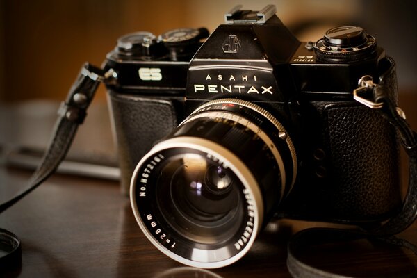 Camera with a lens in the vicinity, brand pentax es