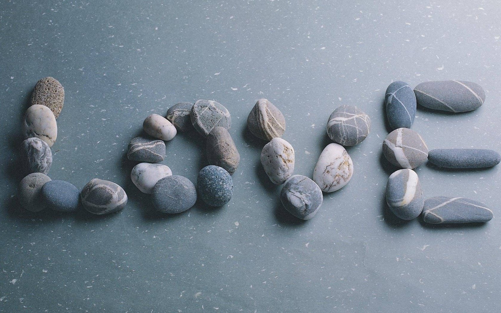 a word about love sea stones stones small seeds the inscription love recognition romance tenderness feeling