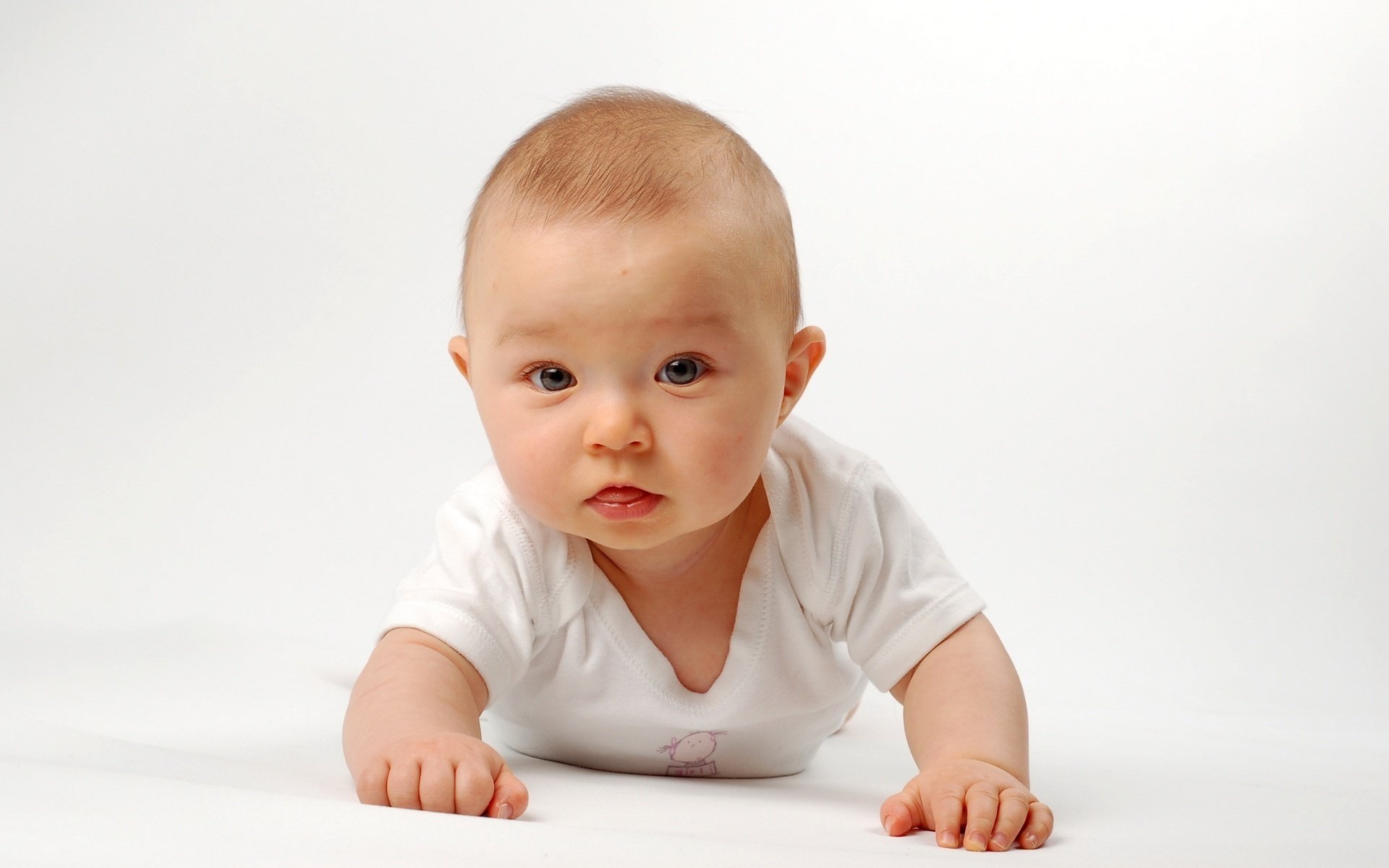 white blouse exploring the world baby portrait look face eye