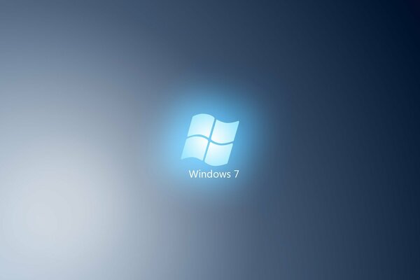 The Windows Seven logo on a blue shining background