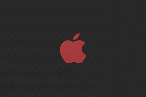 Manzana roja de Apple sobre fondo negro