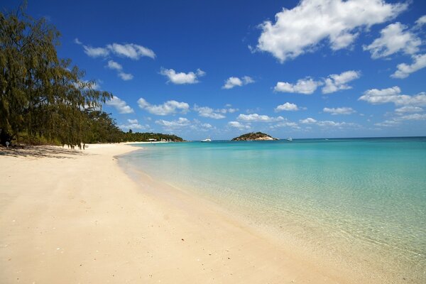 Beach with white sand and blue sea