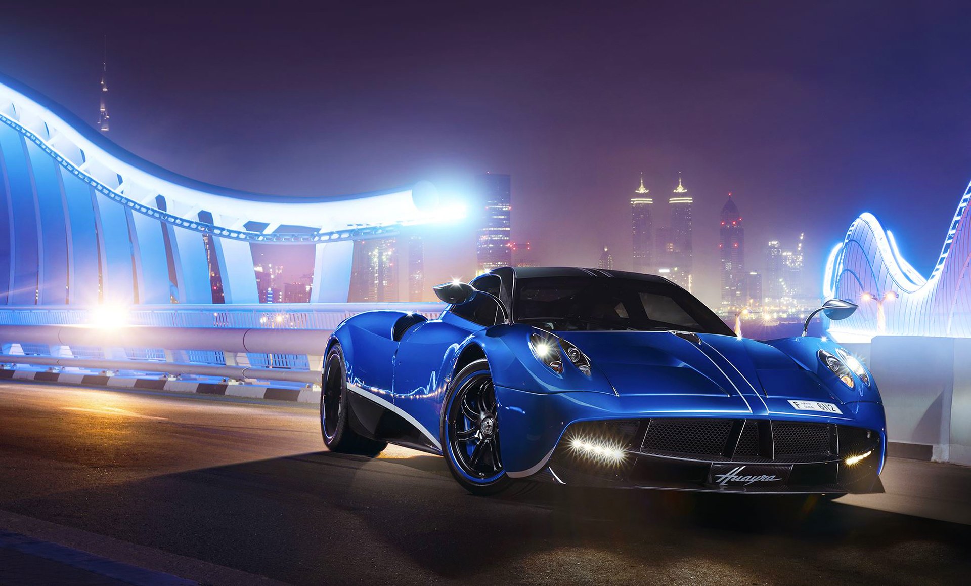 pagani huayra blau supercar licht nigth track vorne