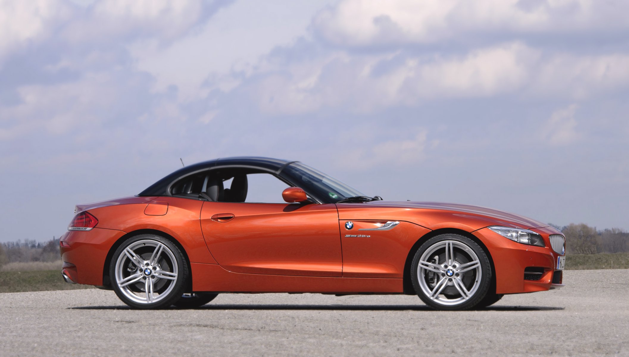 bmw z4 roadster auto bmw side view wheels convertible coupe car boomer orange