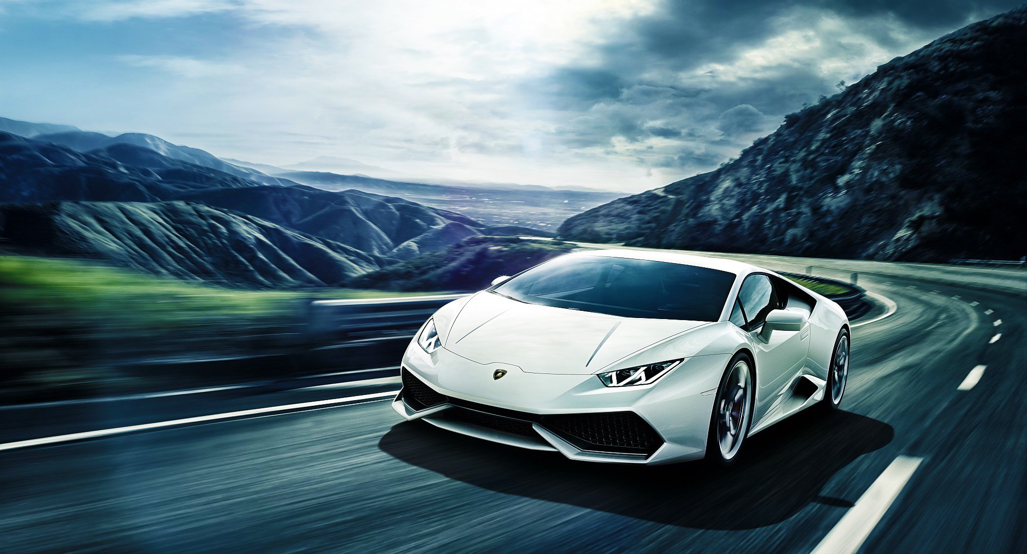 lamborghini uracan lp640-4 blanc supercar montagne route avant