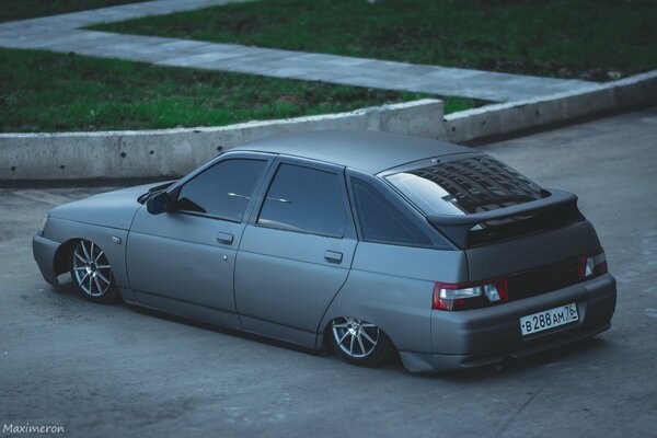 Lada s car is planted in the parking lot