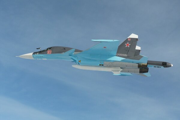 The Su-34 aircraft, manufactured at Sukhoi Design Bureau, makes a scheduled flight