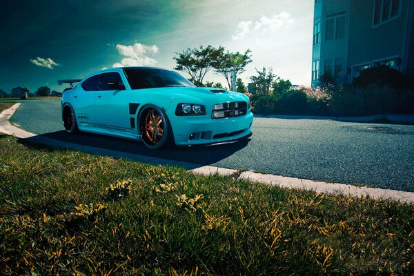 Blue sports car on the road