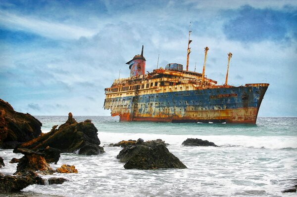 A beautiful old ship is stranded