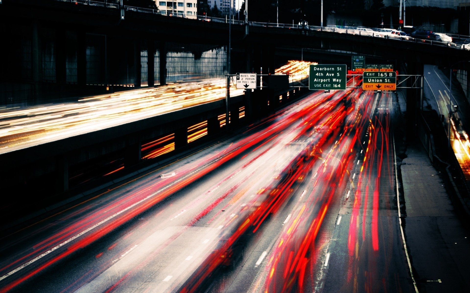 freeway bridge lights speed movement glare the lights of the city. night