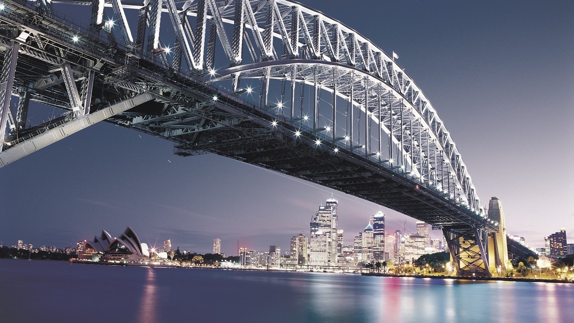 sydney pont australie rivière eau bâtiments ville ciel nocturne nuit lumières de la ville ponts