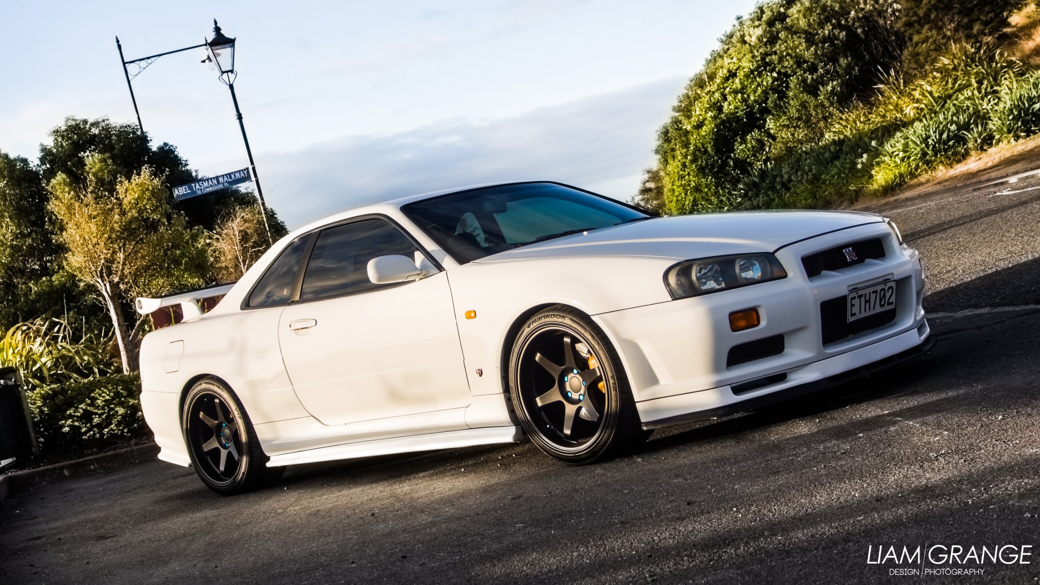 nissan horizon gtr gt-r r34 vspec v spec jdm car nissan skyline yellow yellow car sunset heyday wheels wolf rays tires hankook liam grange