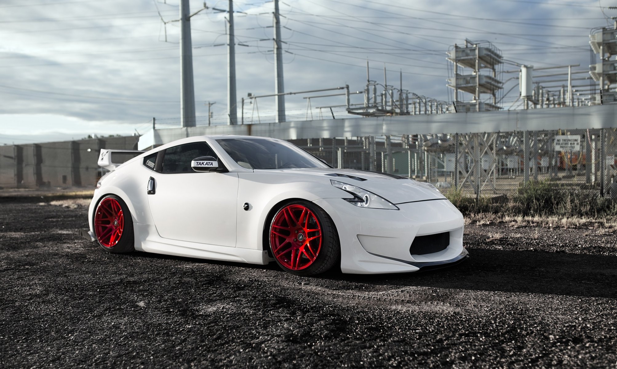 nissan 370z propre pedigree blanc position rouge roues avant