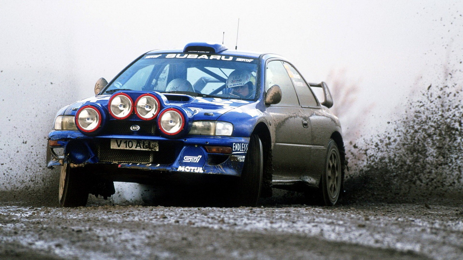 ubaru rally subaru impreza auto road splashes dirt headlights blue car car passenger cars racing rally transport motor transport