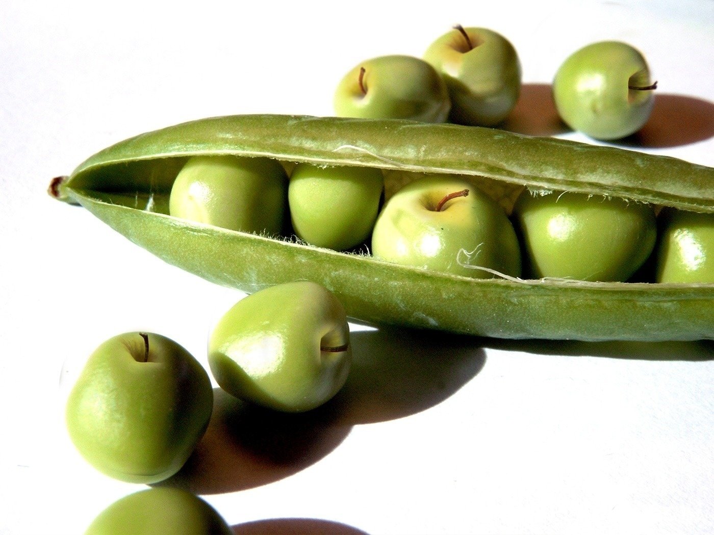 white food background green pod apples fruit