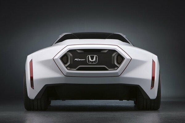 Honda FCsport is white. Rear view