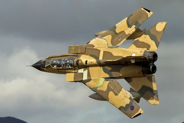 Maneuverable camouflage coloring aircraft in action