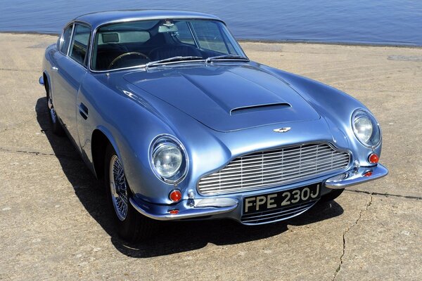 Aston Martin 1969 on the background of the sea