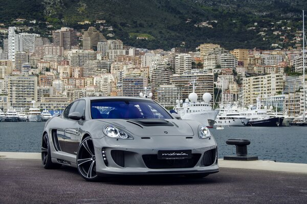 Porsche panamera at the marina near the big city