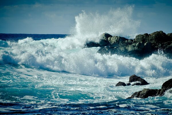 Waves crashing against rocks