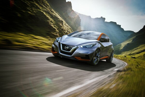 Nissan concept car enters a turn at speed