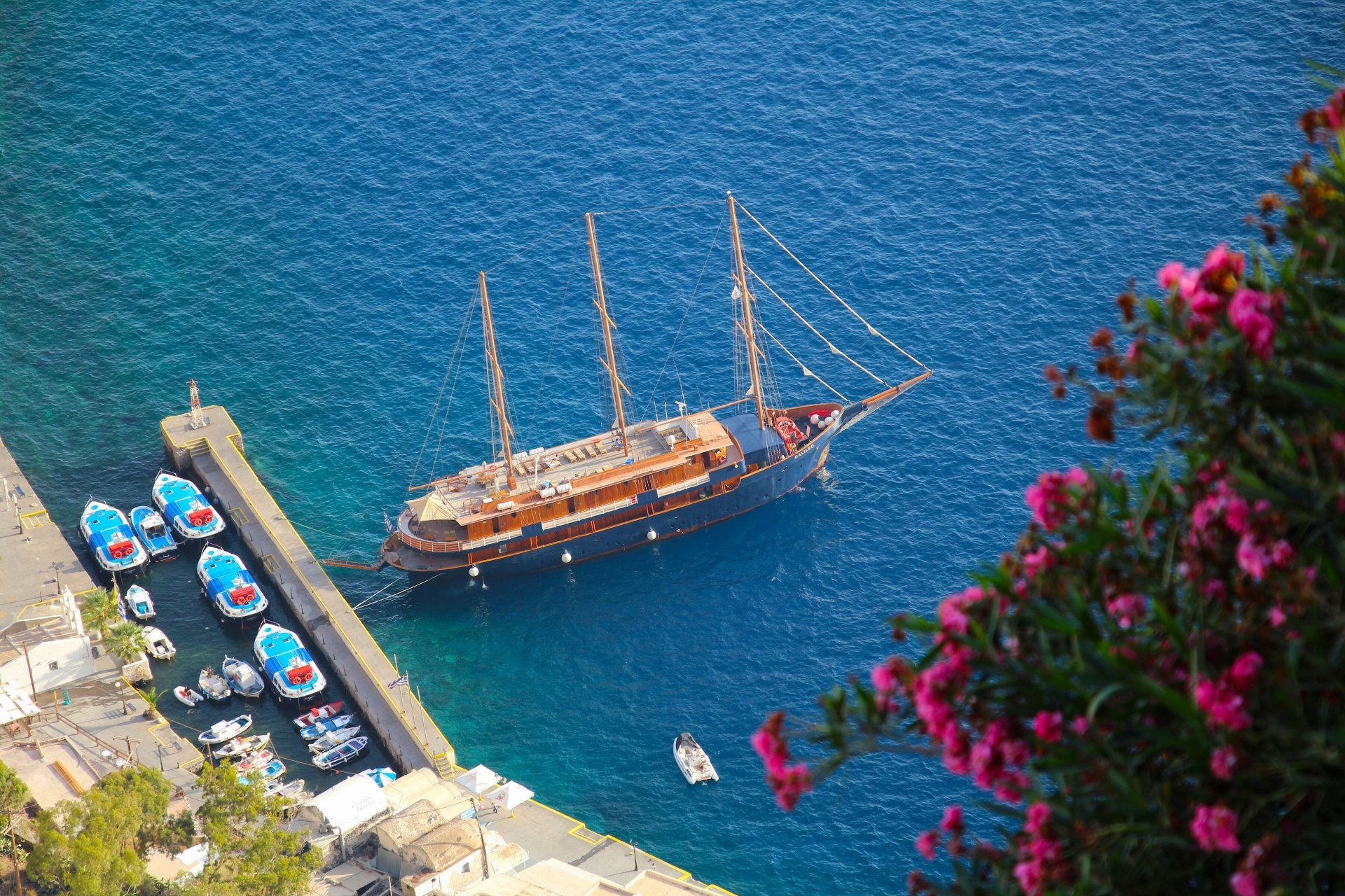 oia santorini greece aegean sea yacht boat pier sea