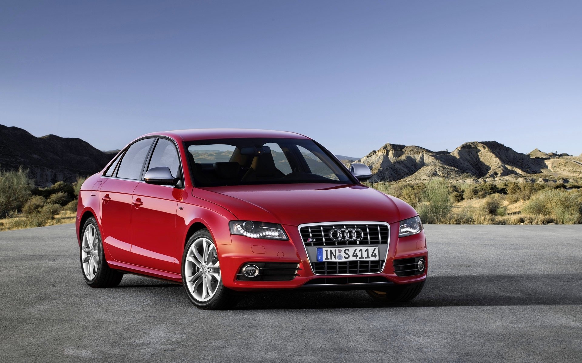 audi s4 audi coche rojo sedán frente faros día parrilla capó