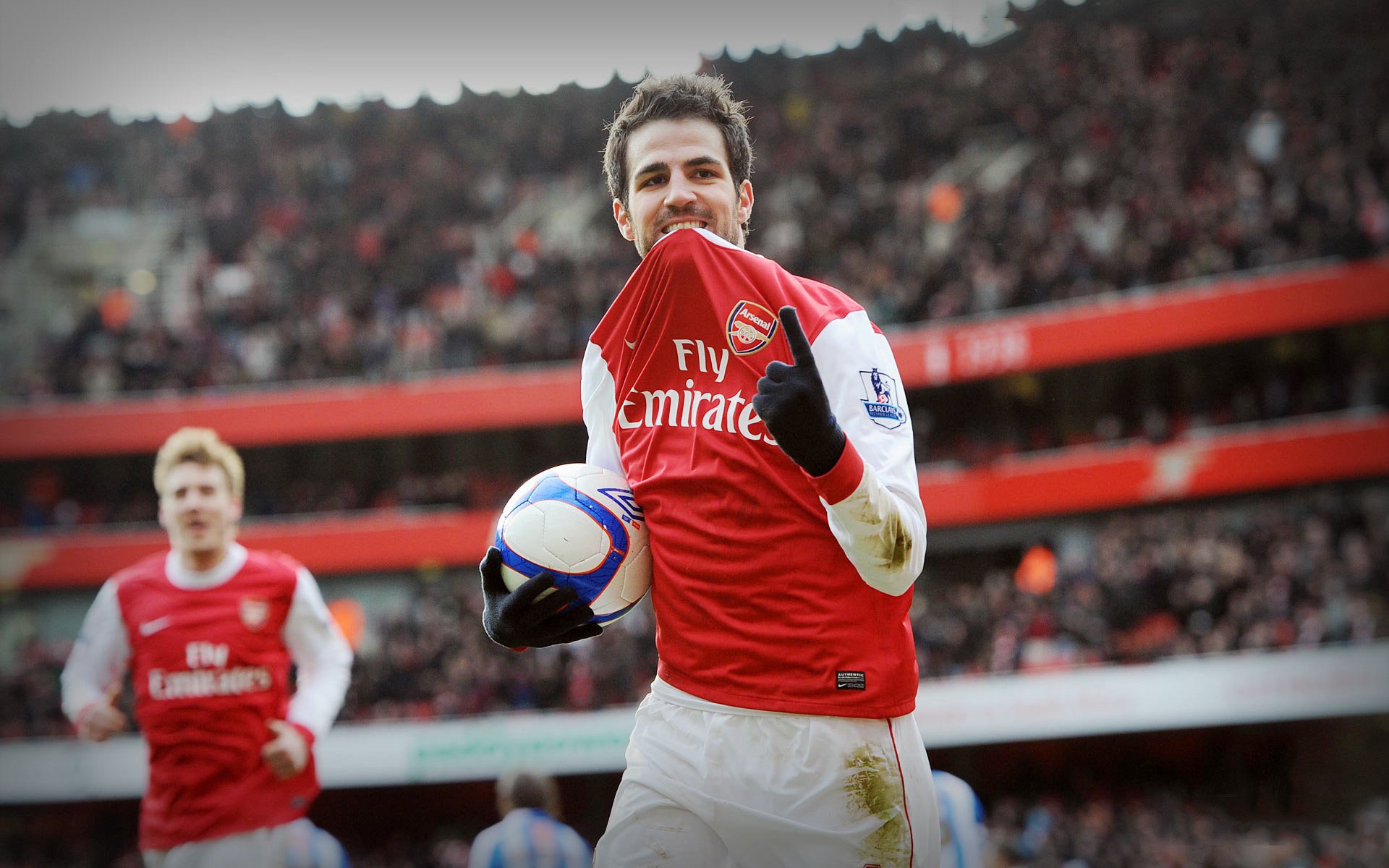 fabregas arsenal football fabregas arsenal football sport ball player gesture stadium duel game fans football players red uniform