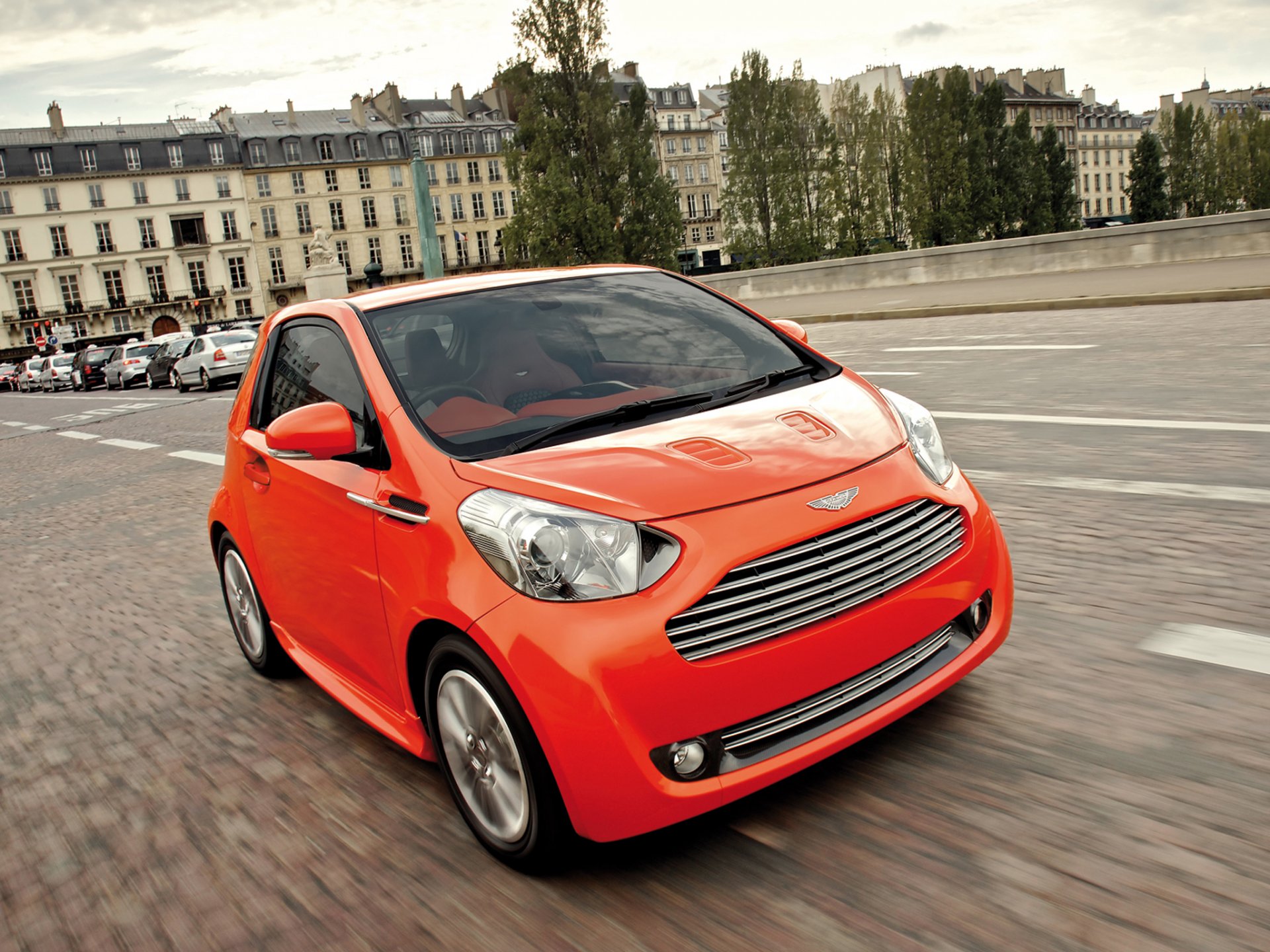 aston martin cygnet máquina aston martin naranja