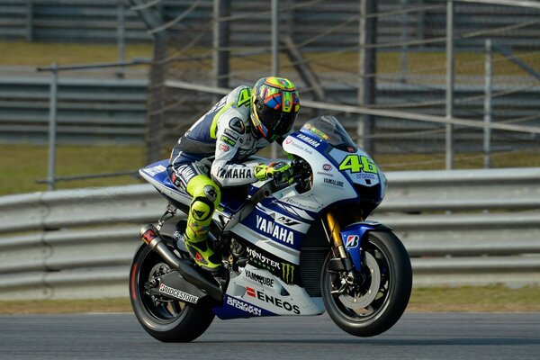 Valentino Rossi rides his motorcycle on the road