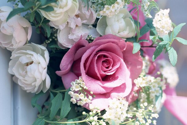 Roses and peonies in a beautiful spring bouquet