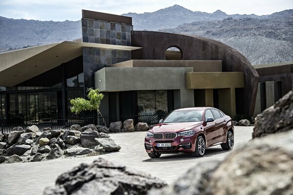 A new car on the background of a new house