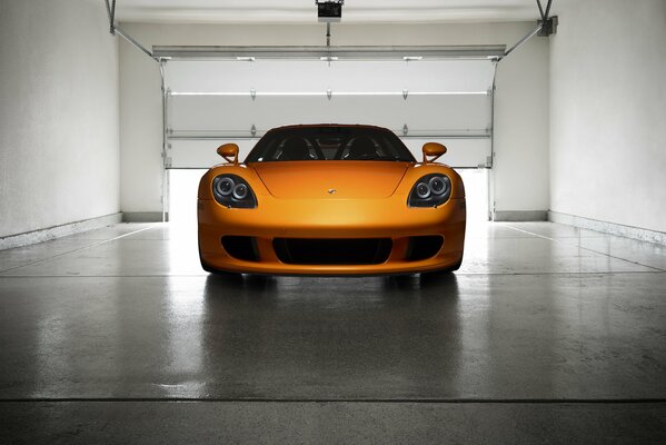 Super car orange porsche caretta