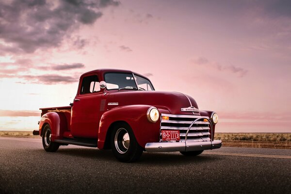 Red vintage Chevrolet on the road