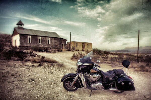 Black bike on the background of beautiful clouds