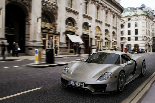 Porsche is driving at high speed on the street