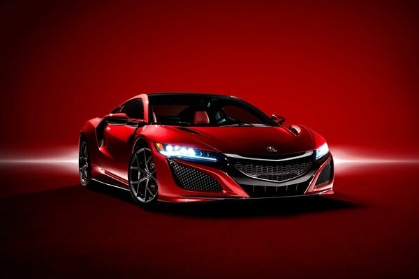 Red Acura concept car on a red background