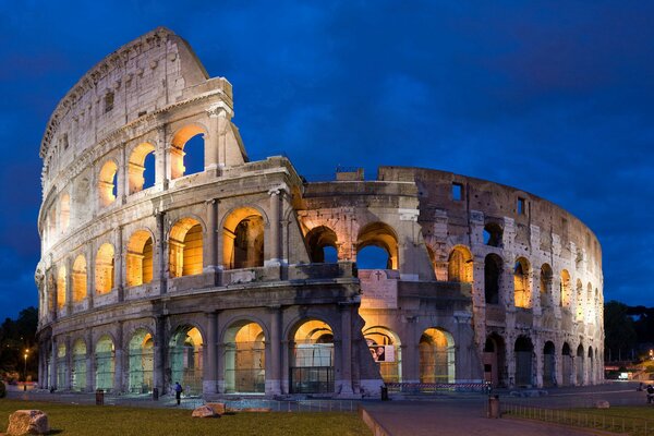 Colosseum in the night sky of Rome