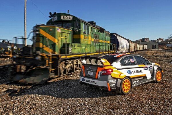 Train and subaru on the railway