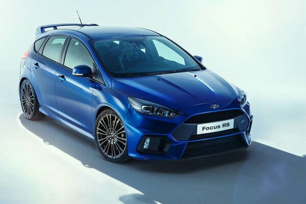 Picture of a Ford focus blue car on a light background