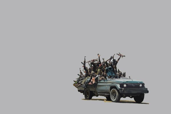 Armed rebels are driving a pickup truck