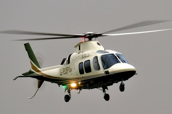 Photo of an eight-seat helicopter in flight