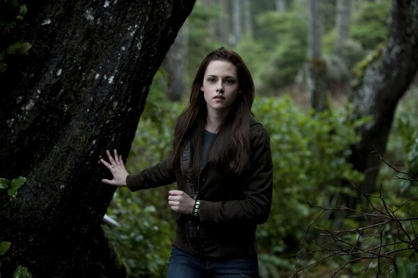 Kristen Stewart in the woods, a frame from the movie