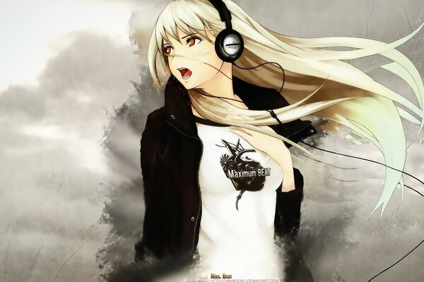 Long-haired blonde listening to music with headphones