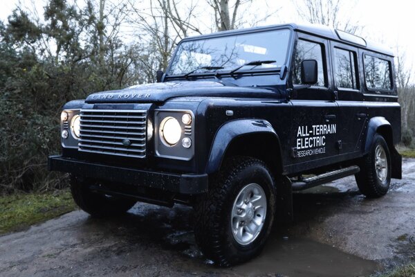 The land rover SUV will drive through any dirt when it is cloudy